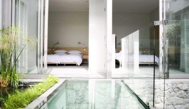 Green Point - Completed residence Bedroom pond view